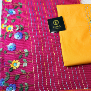 Pink Kota cotton saree with multicolor striped thread work and floral embroidery border, paired with a mustard blouse, showcasing lightweight handcrafted detailing.